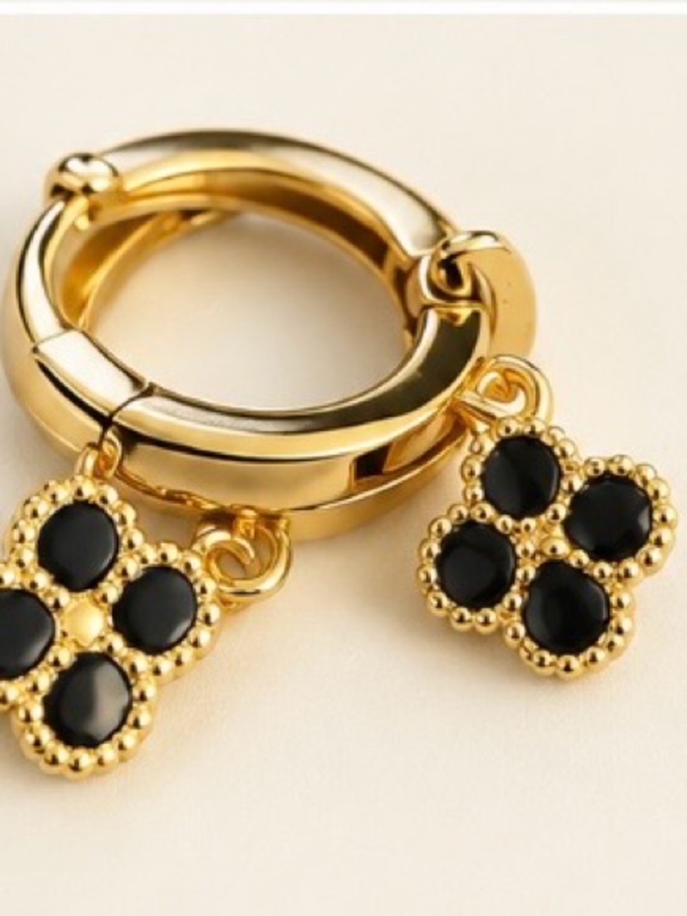 Gold Hoop Earrings with Black Clover Charms
